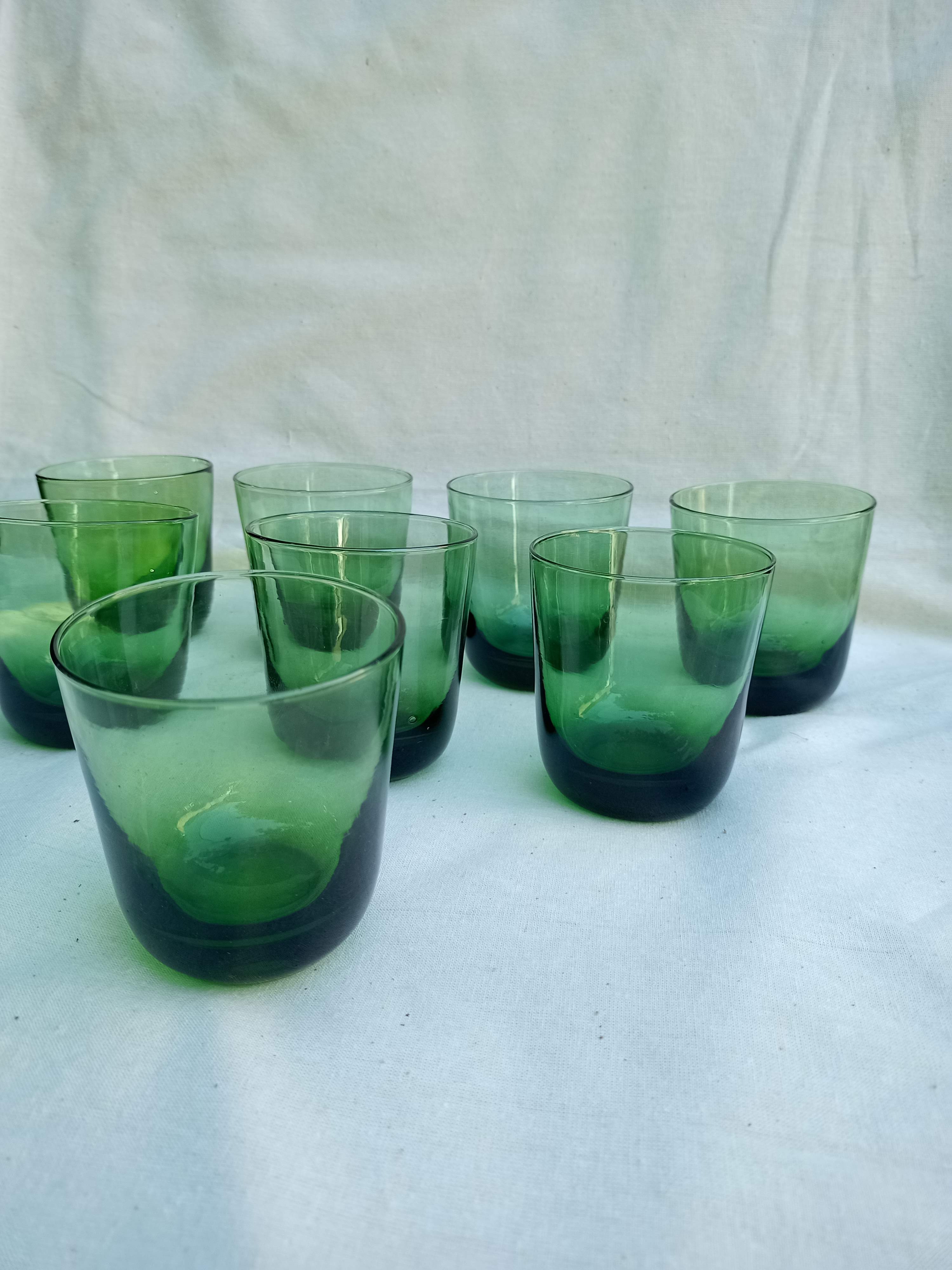 Vintage glasses in slightly bulled green glass