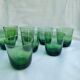 Vintage glasses in slightly bulled green glass
