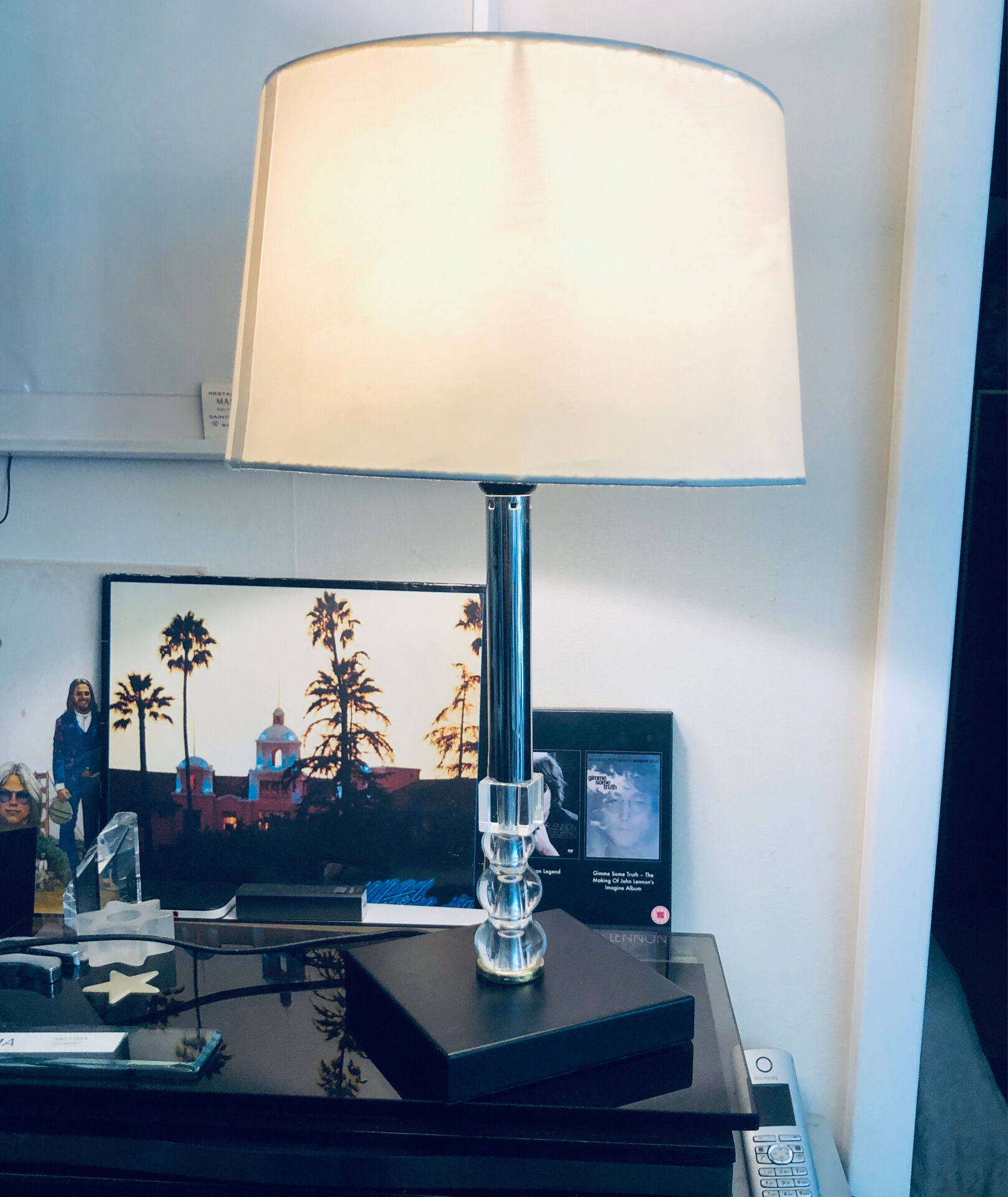 Silver-plated metal lamp base with crystal.