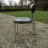 6 vintage chairs in black skaï with chrome metal tubular base.