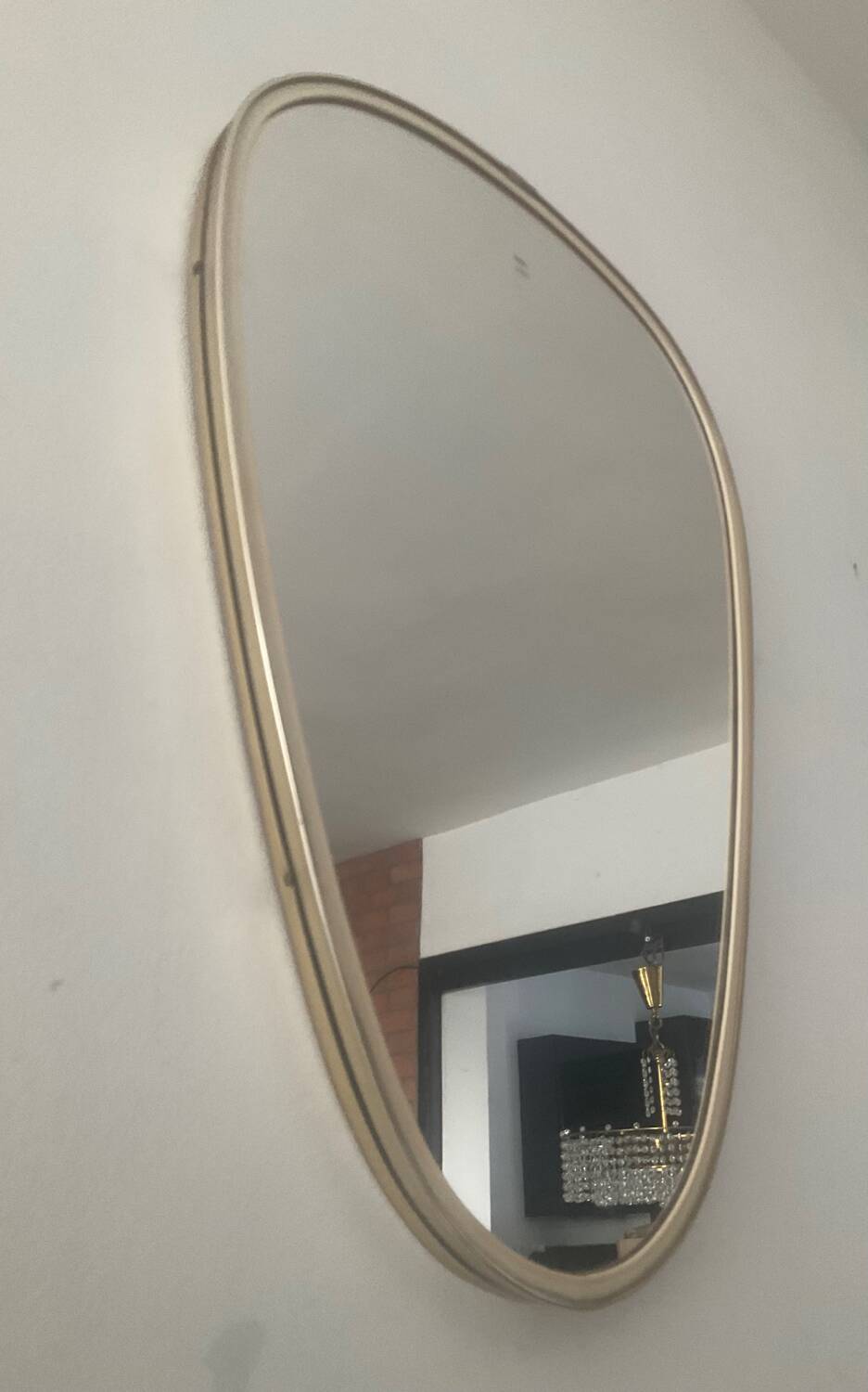 Asymmetrical free-form mirror from the 60s-70s