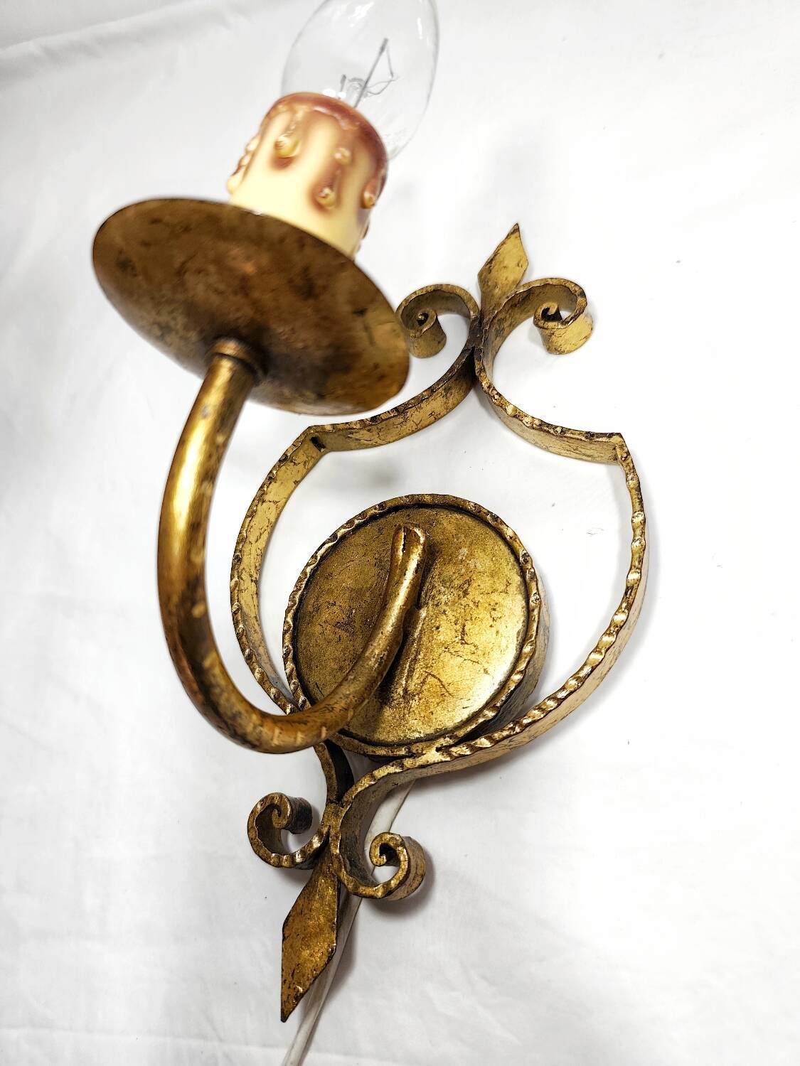 Apliques de hierro forjado y pan de oro. España, 1960s.
