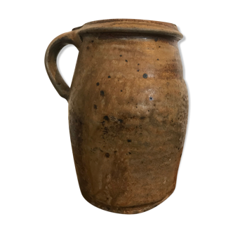 Ancient sandstone pot at one handle