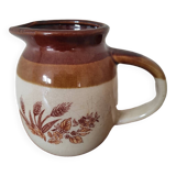Glazed ceramic pitcher