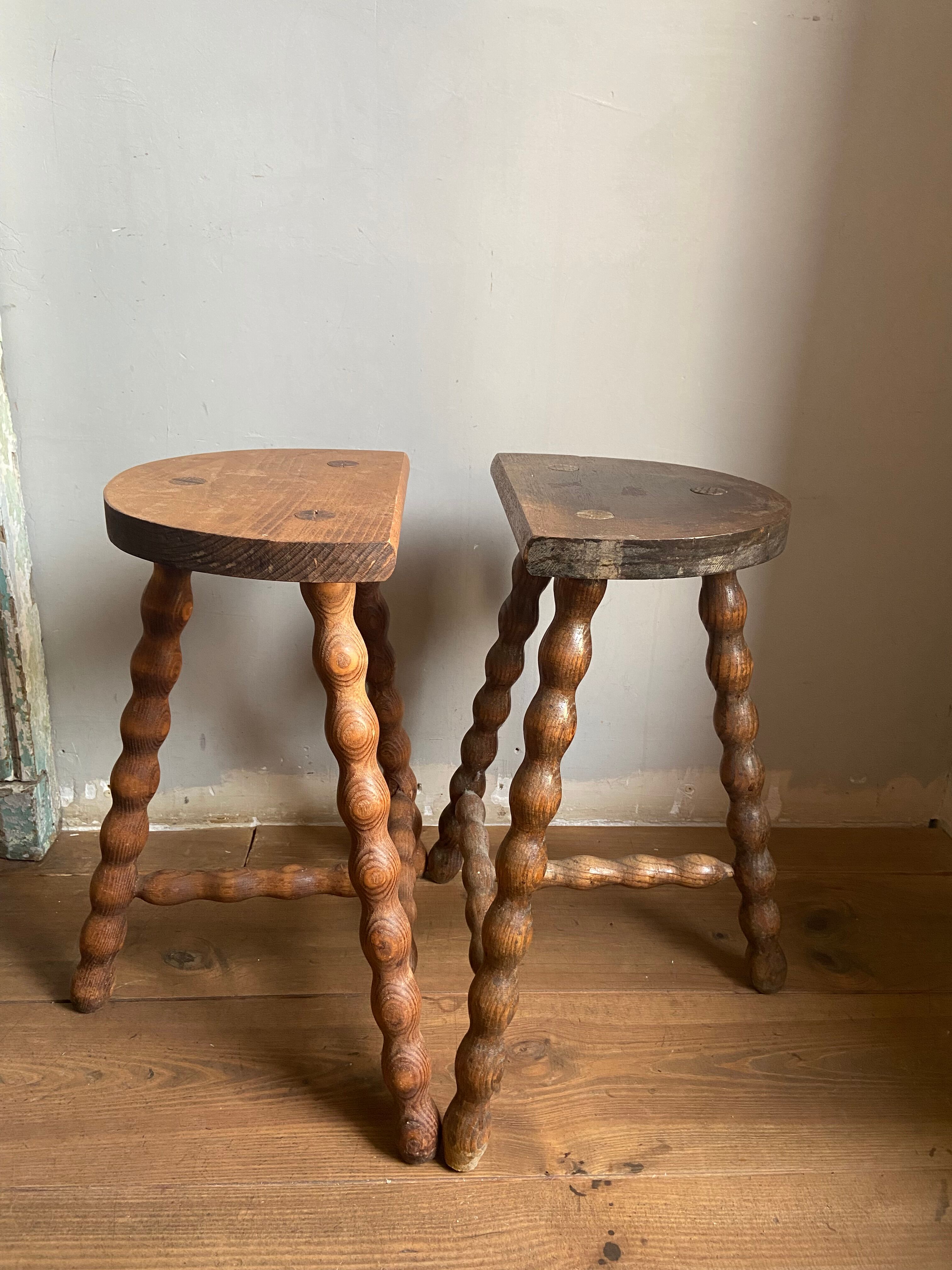 Pair of wooden milkman's stools turned brutalist