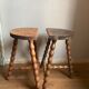 Pair of wooden milkman's stools turned brutalist