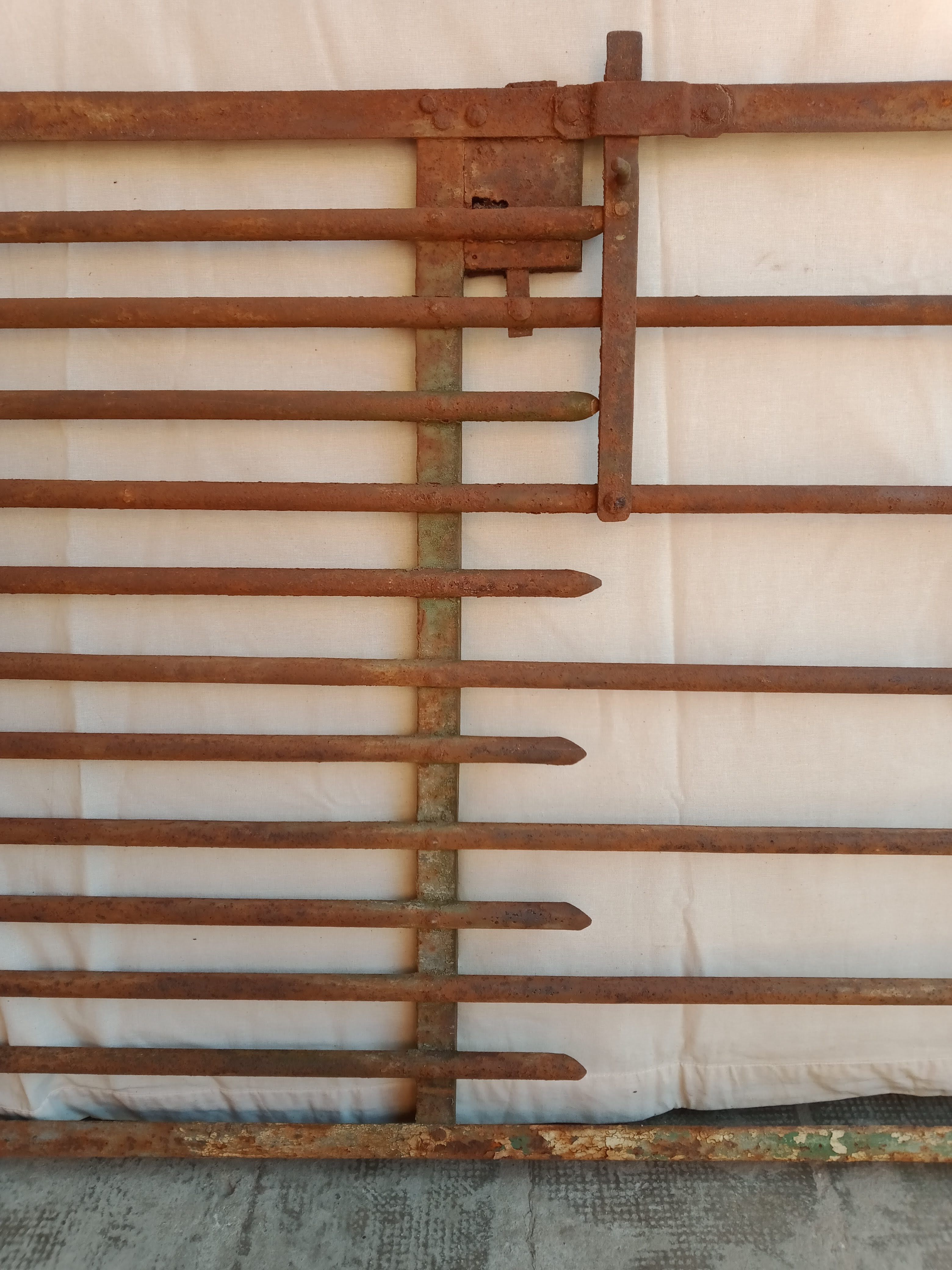 Old riveted metal gate