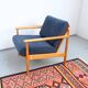 Vintage retro armchair from the 60s-70s in teak, Mid-Century style.