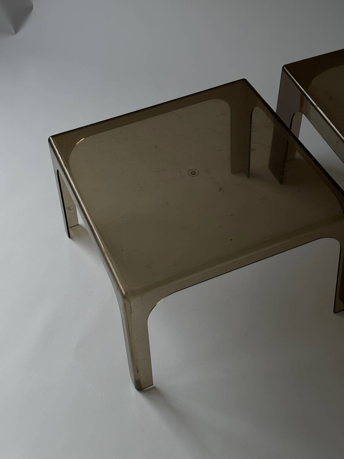 Smoked plastic coffee tables 1970