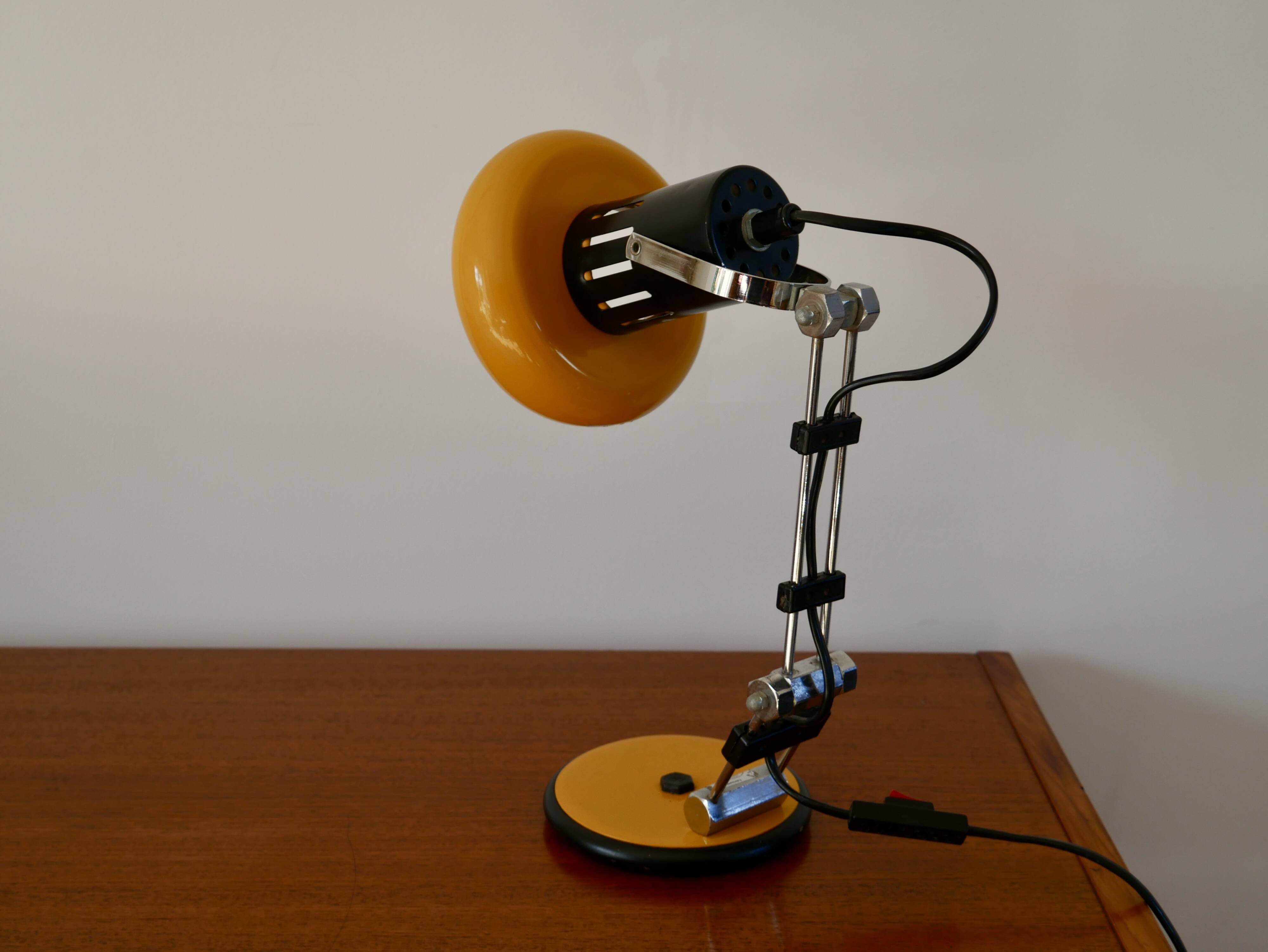 Articulated orange Aluminor desk lamp industrial design 70s
