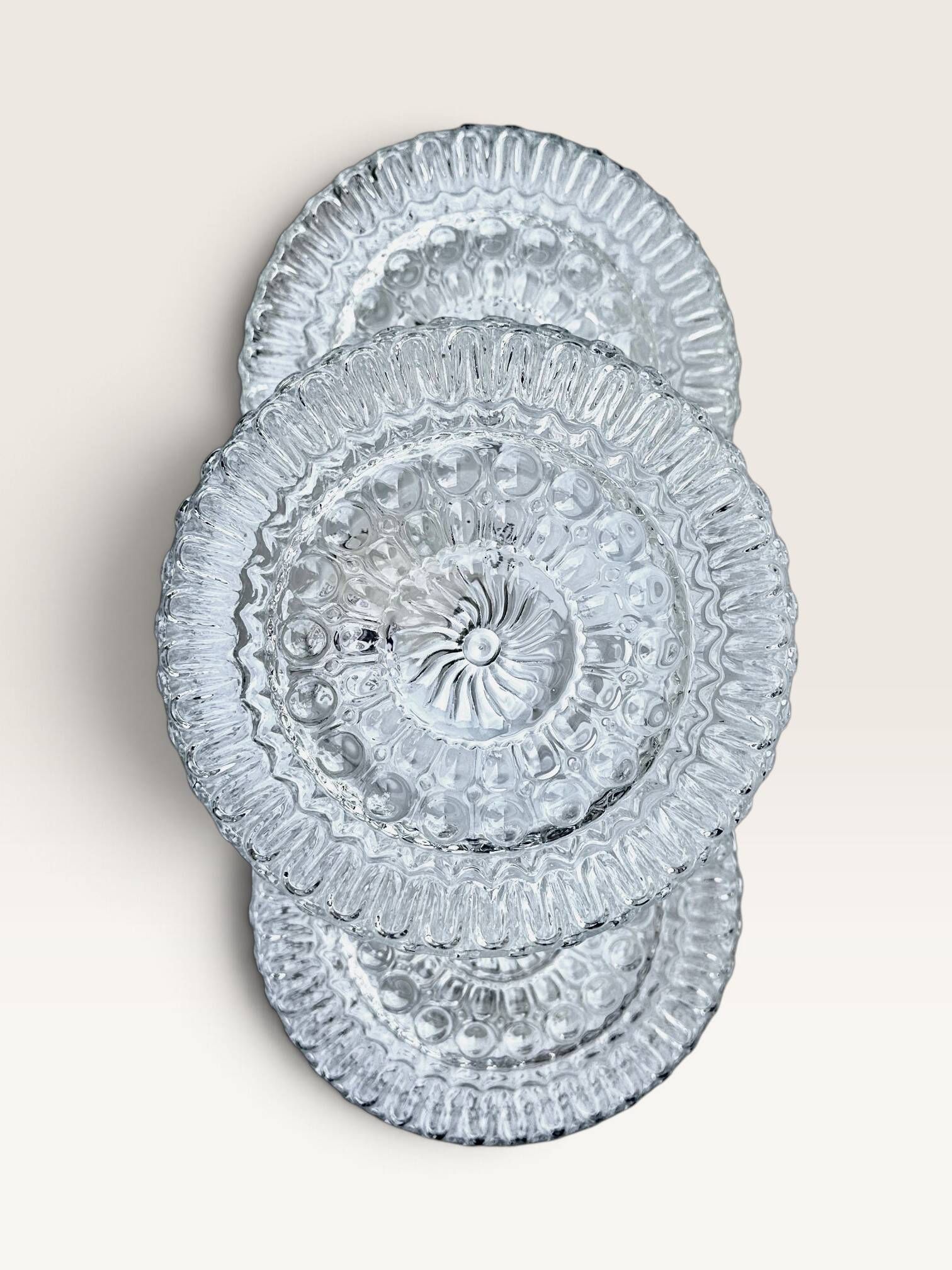 Set of three round wall/ceiling lights in moulded glass.
