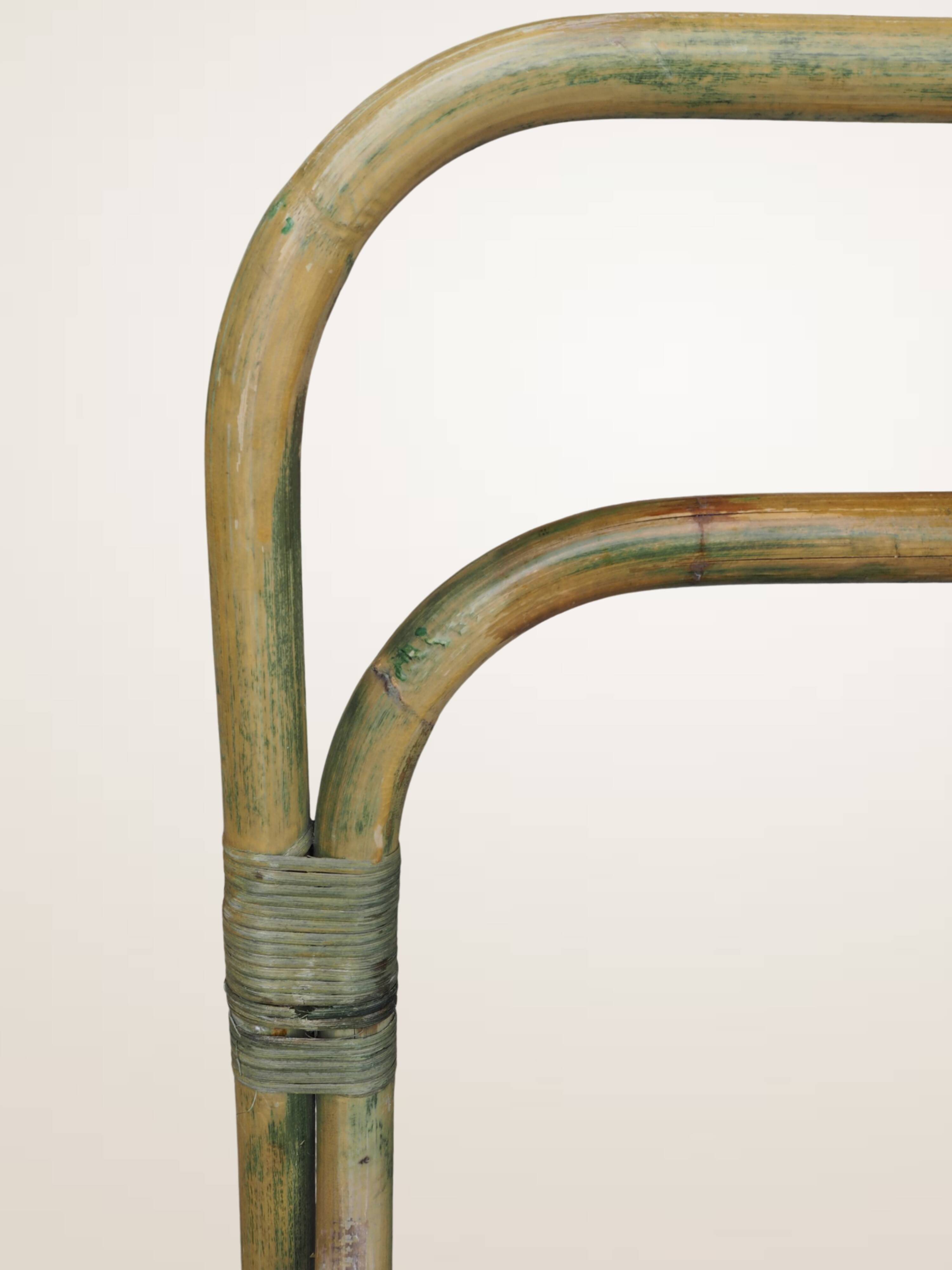 Pair of curved bamboo armchairs