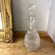 Large blown glass decanter and relief decoration