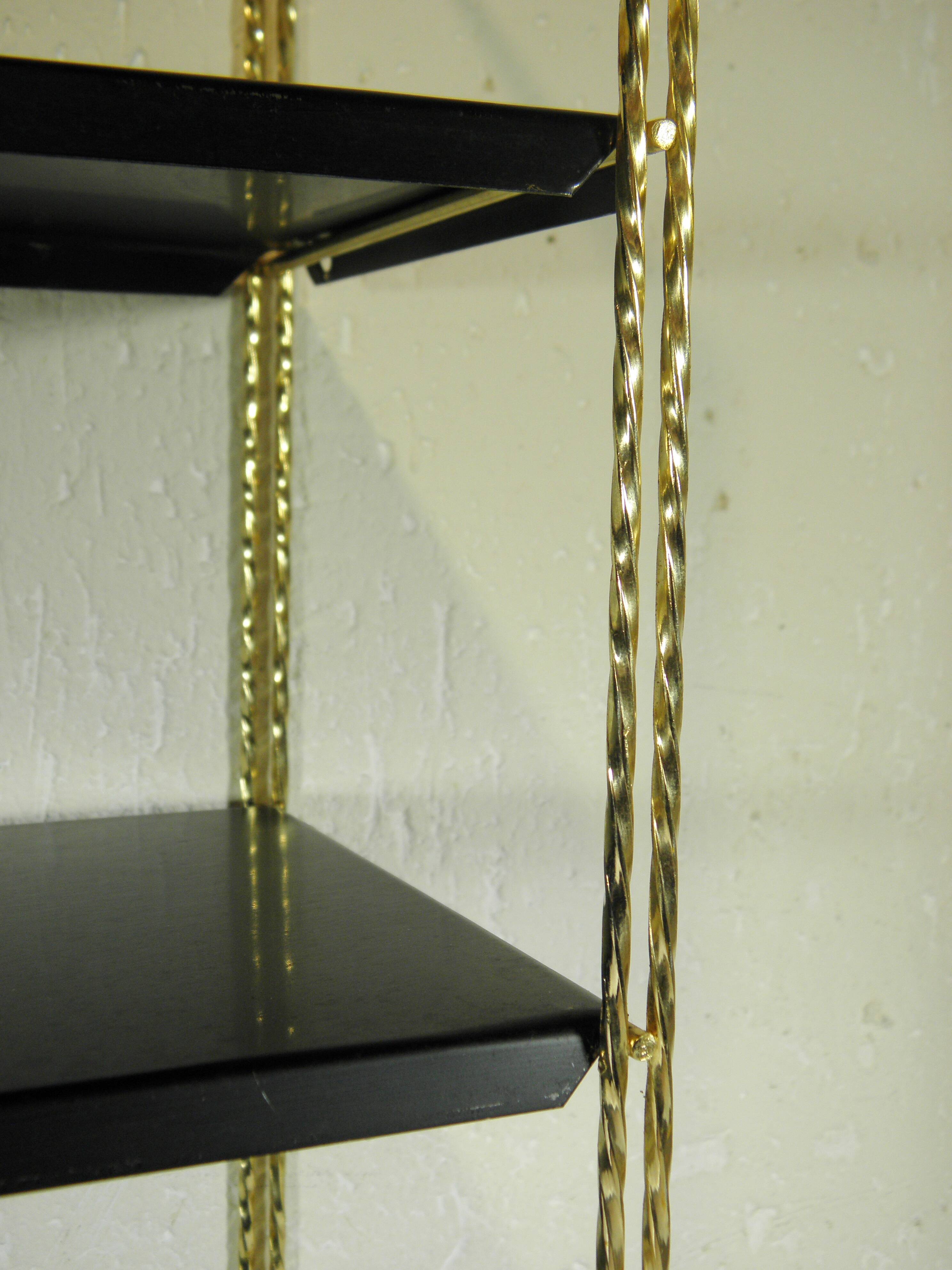 Black and gold metal wall shelf from the 1960s