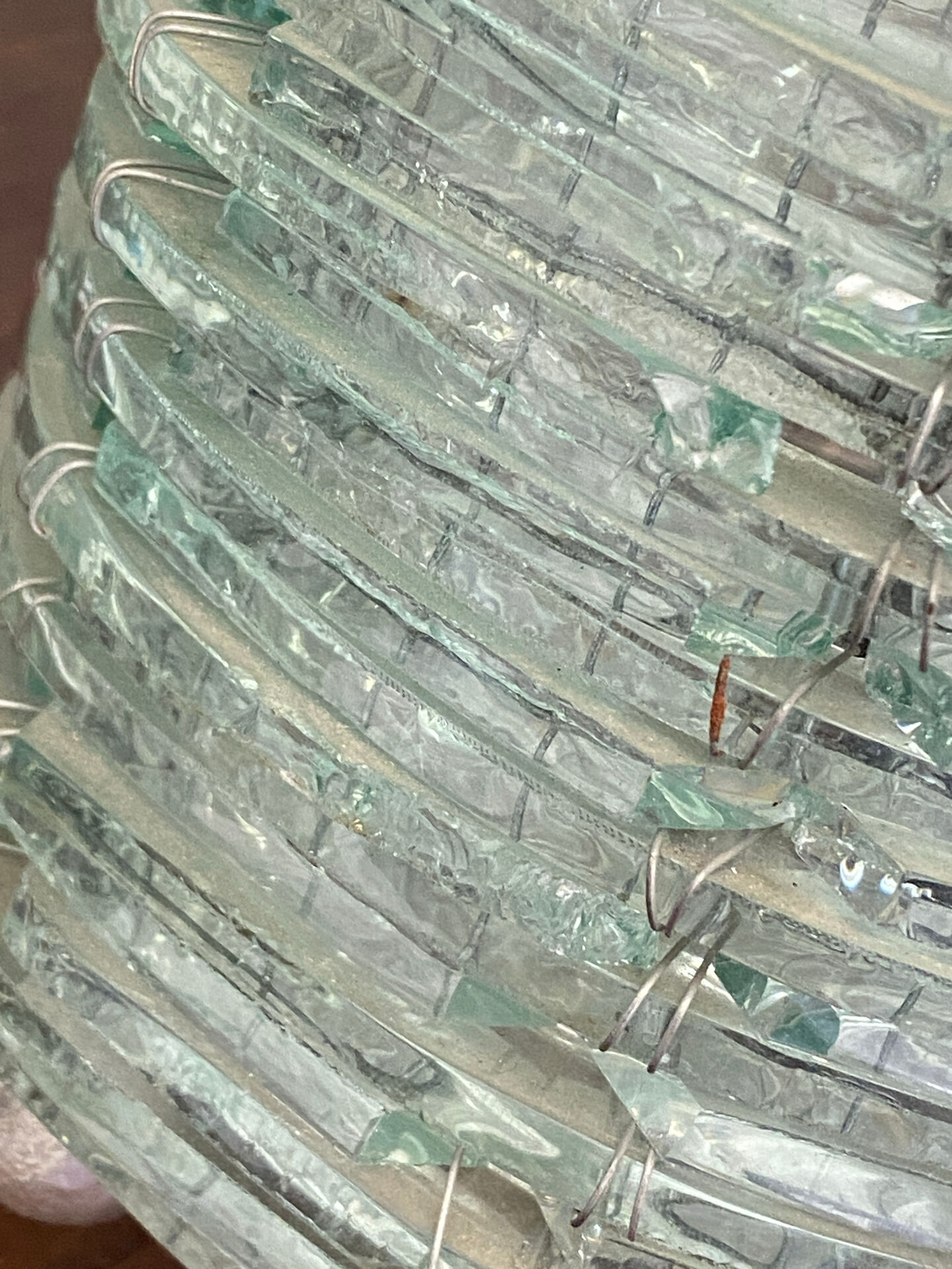 Blue-tinted glass lamp and wire.