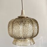Small glass ball pendant light with amber plant effect
