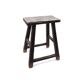 Rectangular stool in raw black elm.