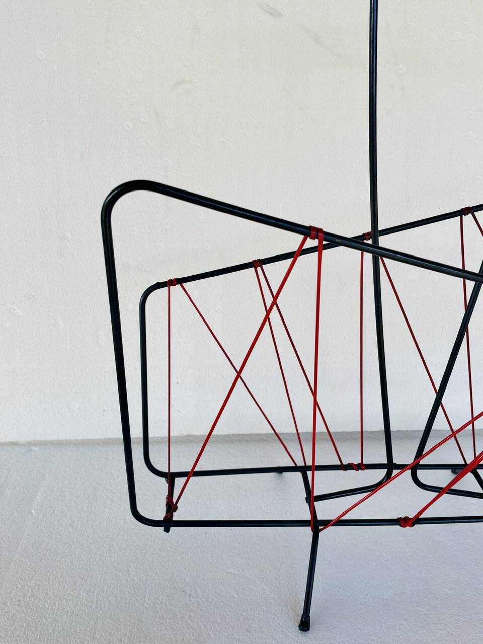 Vintage black metal magazine rack circa 19