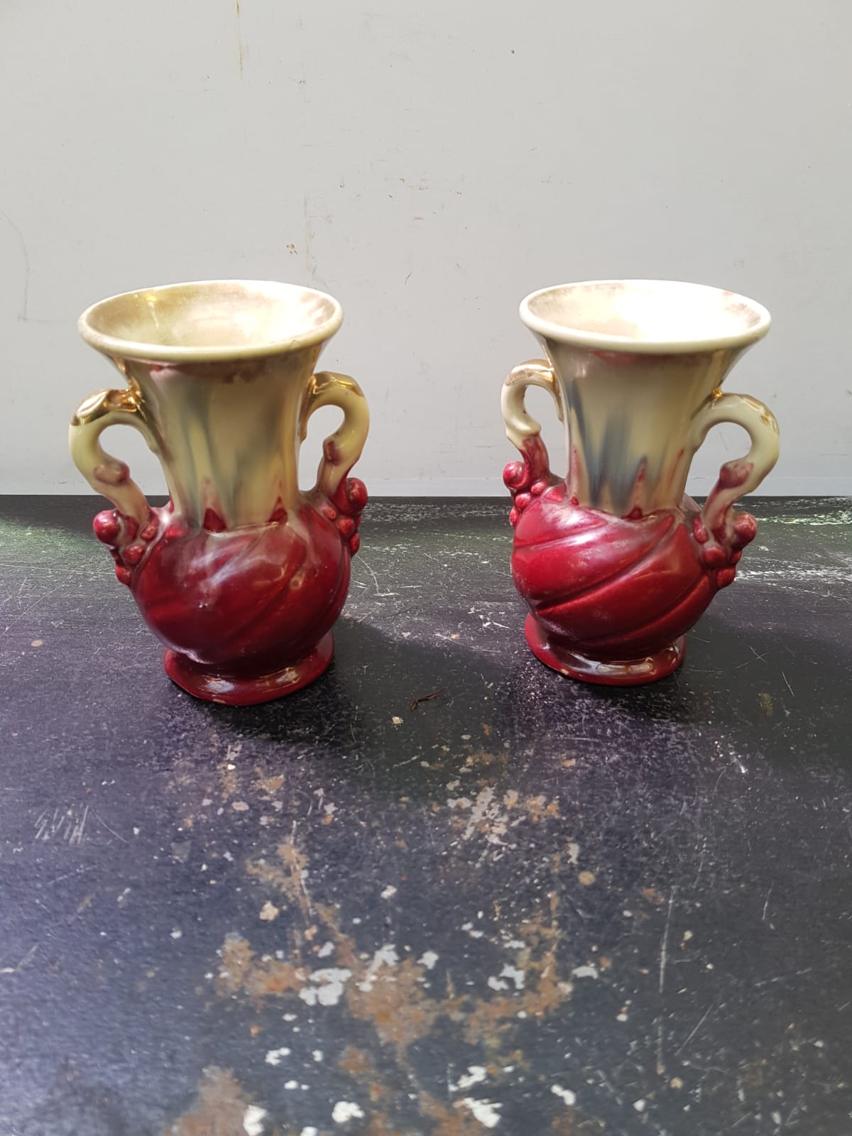 Pair of old beige & red ceramic vases