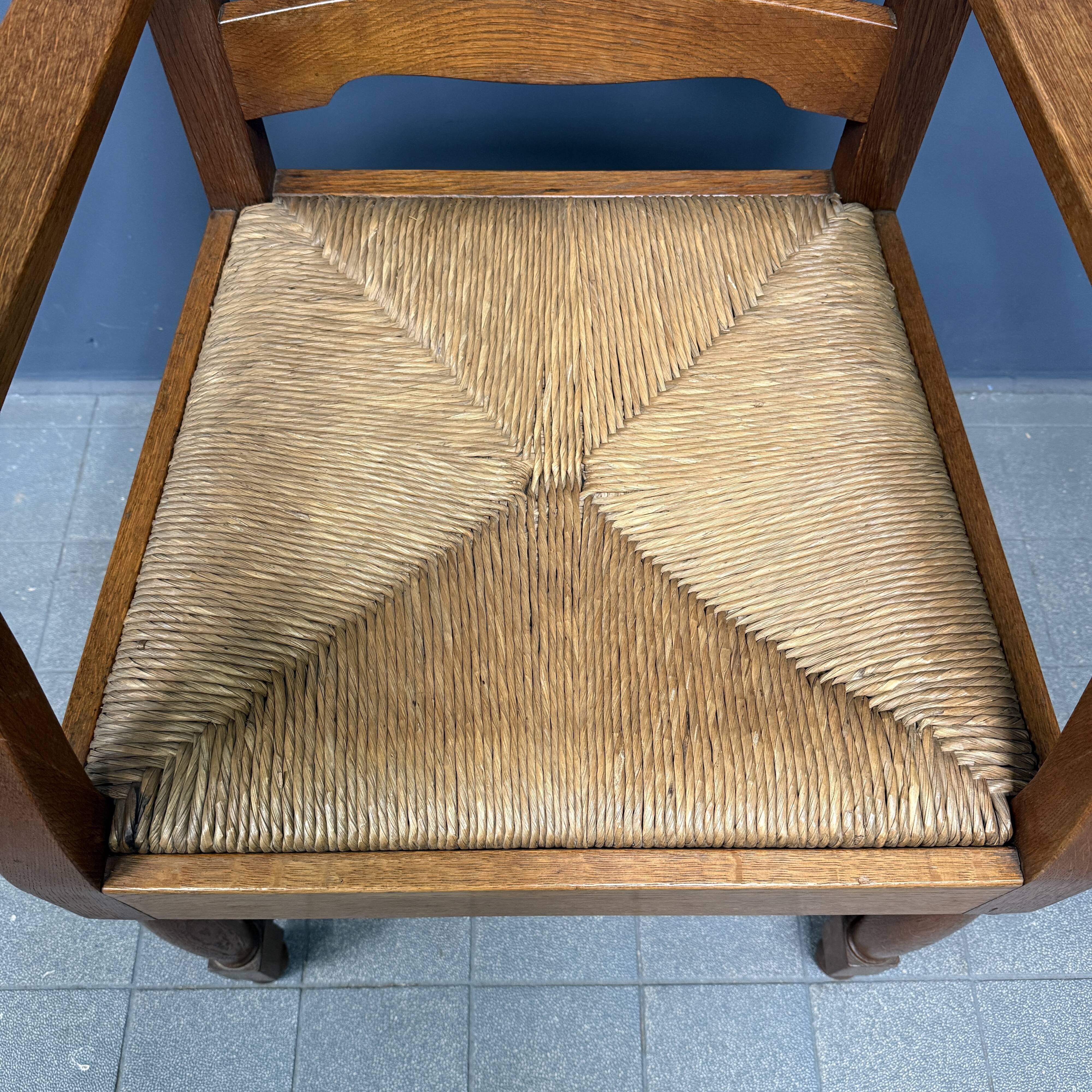 Set of two Dutch oak armchairs with rush seats