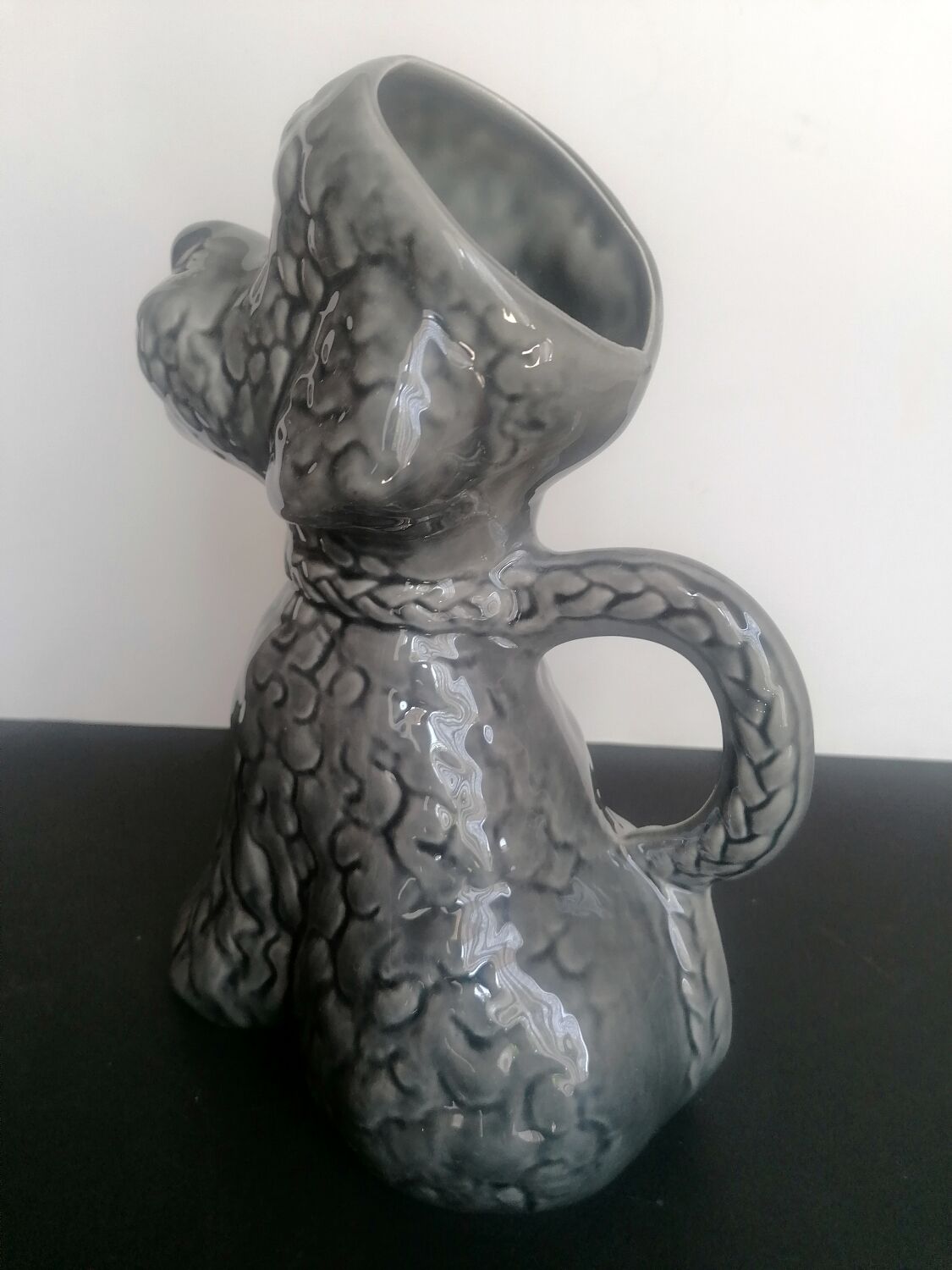 Zoomorphic pitcher slurry poodle