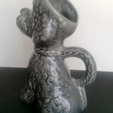 Zoomorphic pitcher slurry poodle