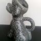 Zoomorphic pitcher slurry poodle