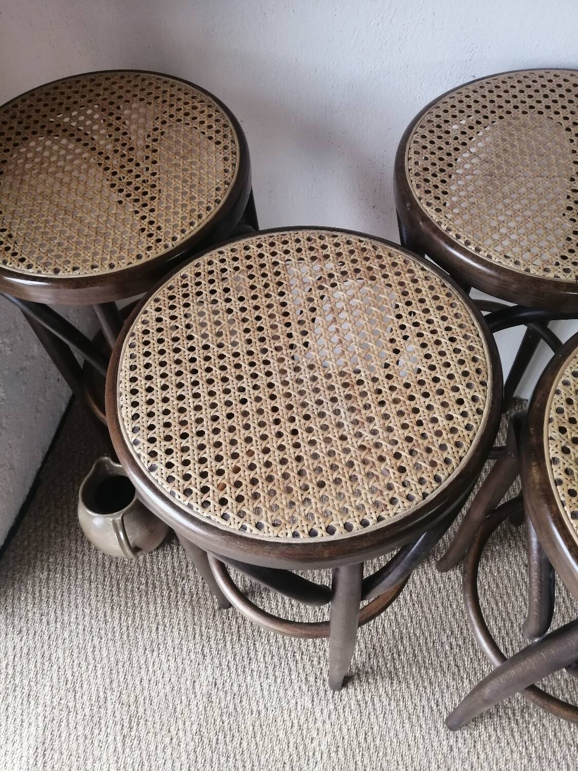 Set of 4 high bistro stools in curved wood and canework.