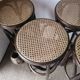 Set of 4 high bistro stools in curved wood and canework.