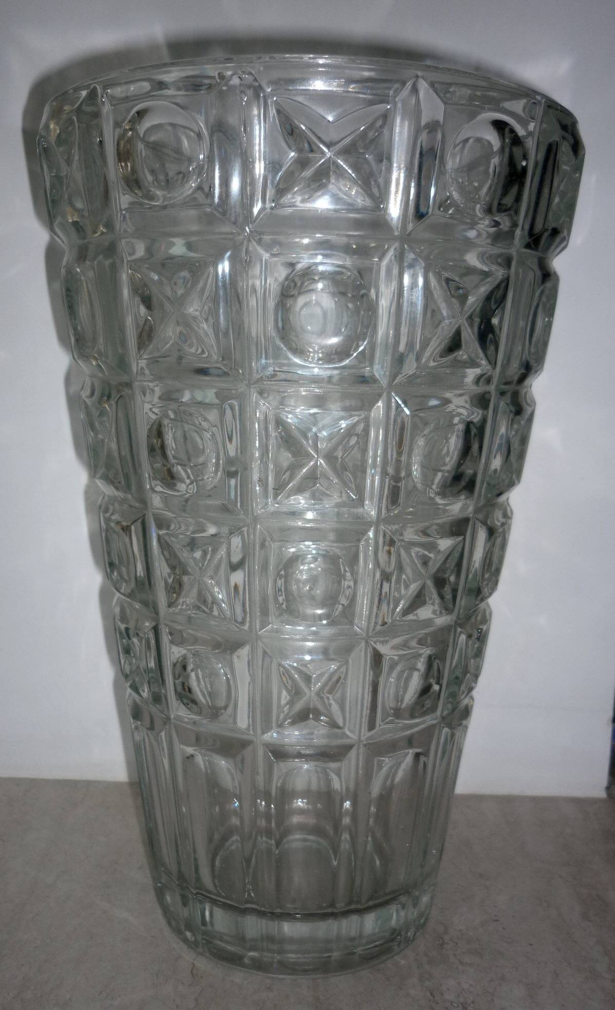 Transparent glass vase with art deco geometric patterns