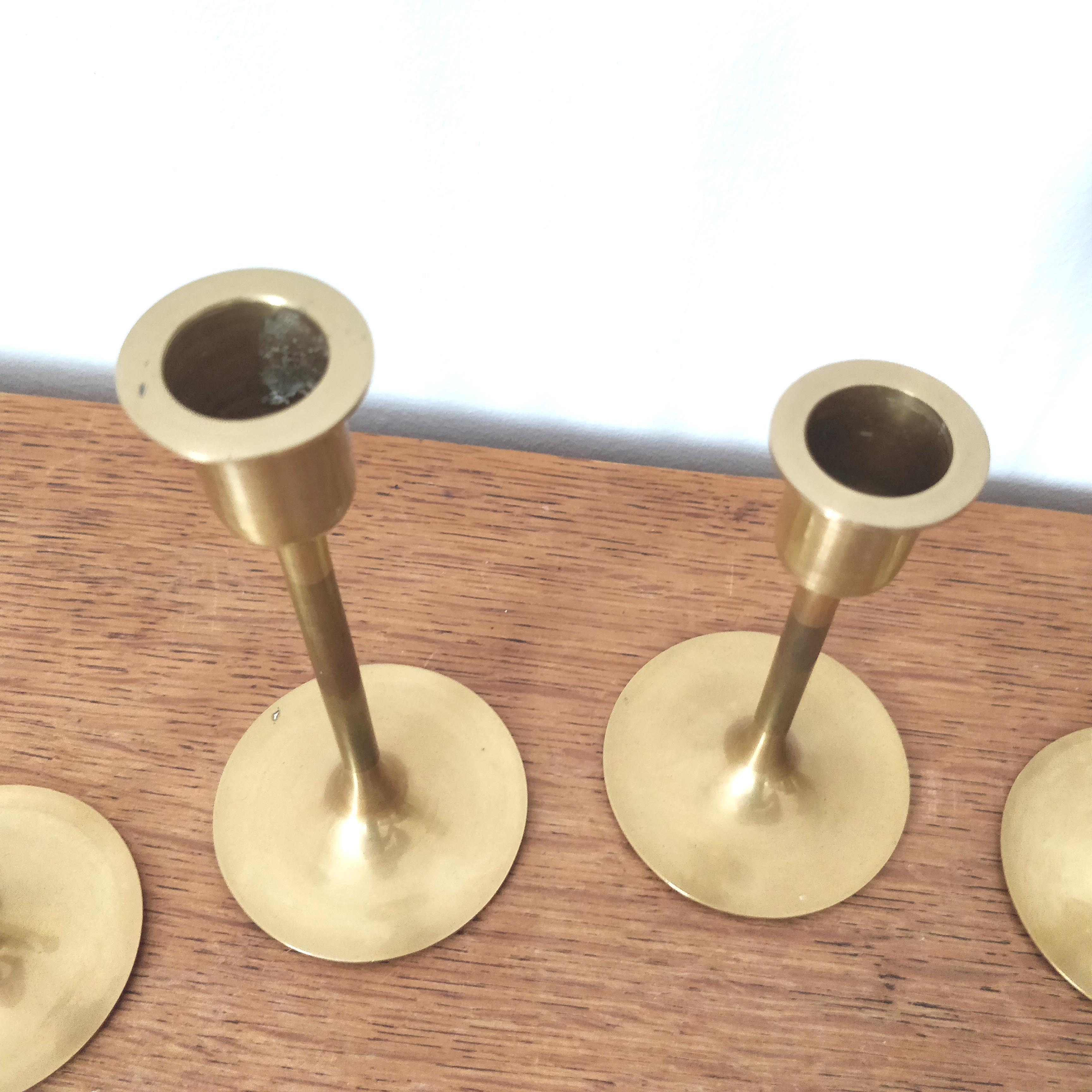 Set of 7 brass candlesticks