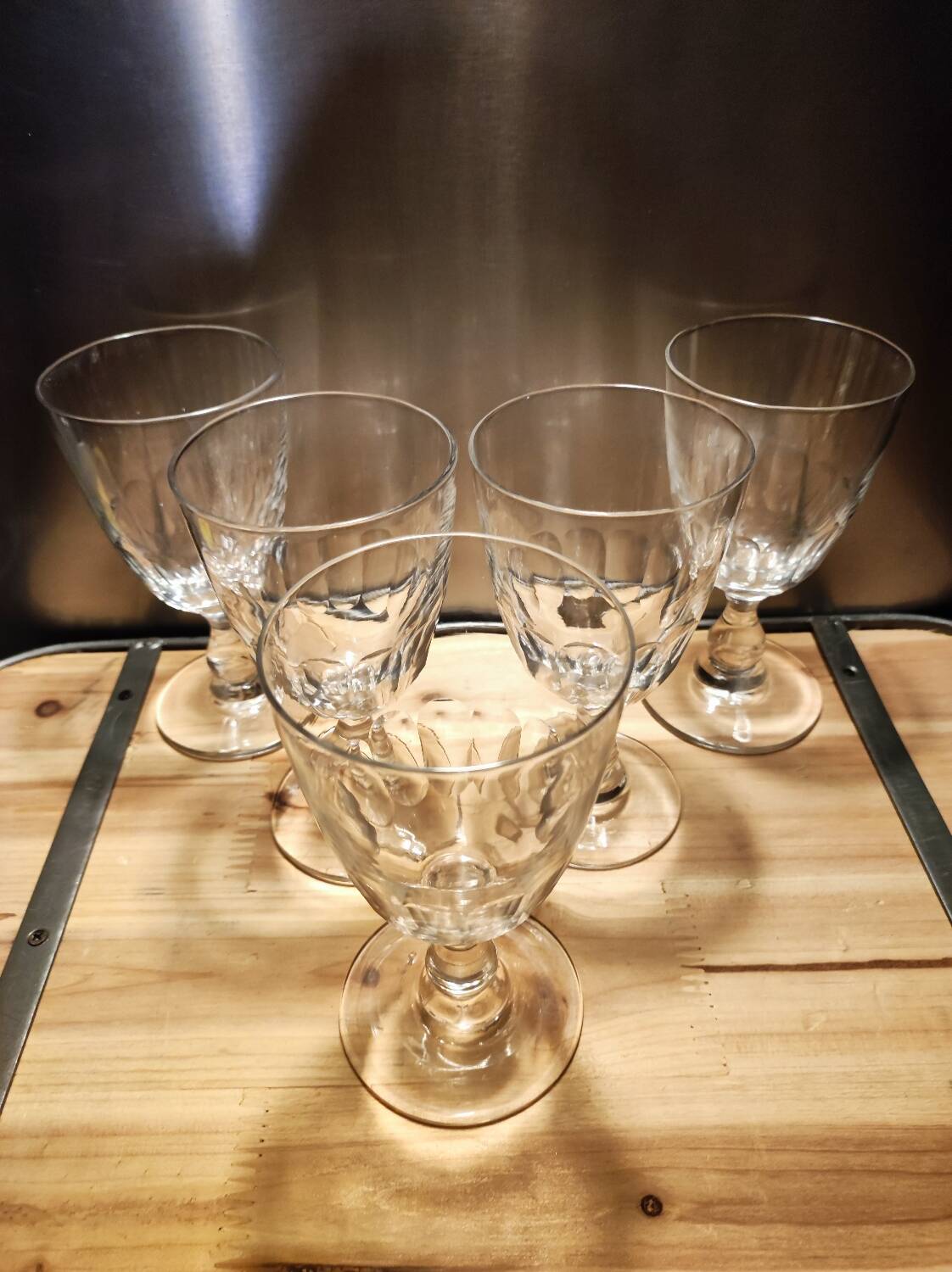 5 antique wine glasses with cut sides