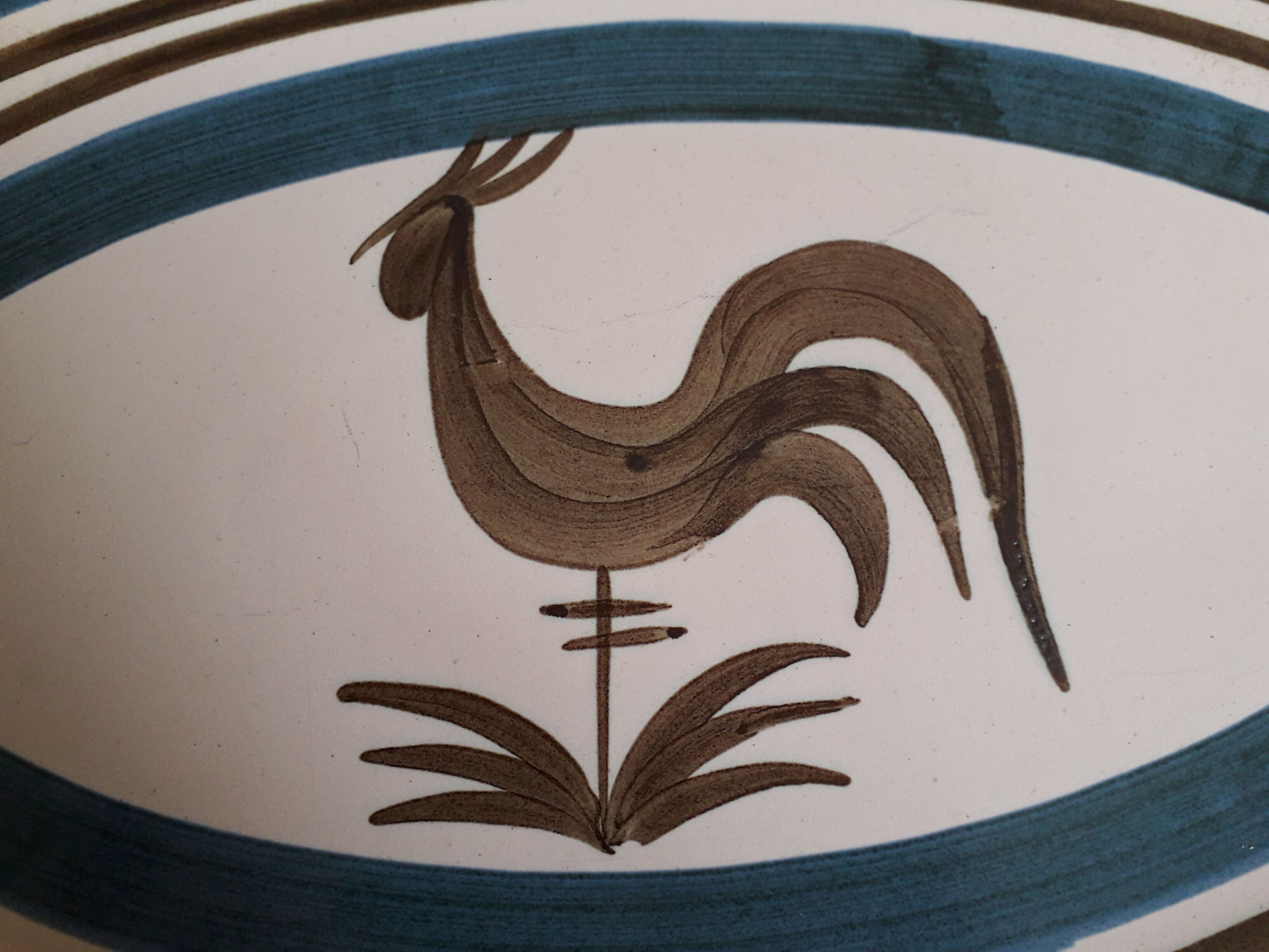 Longchamp sandstone dish with 70s rooster decorations