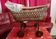 Vintage wicker cradle on wheels from the 1970s.