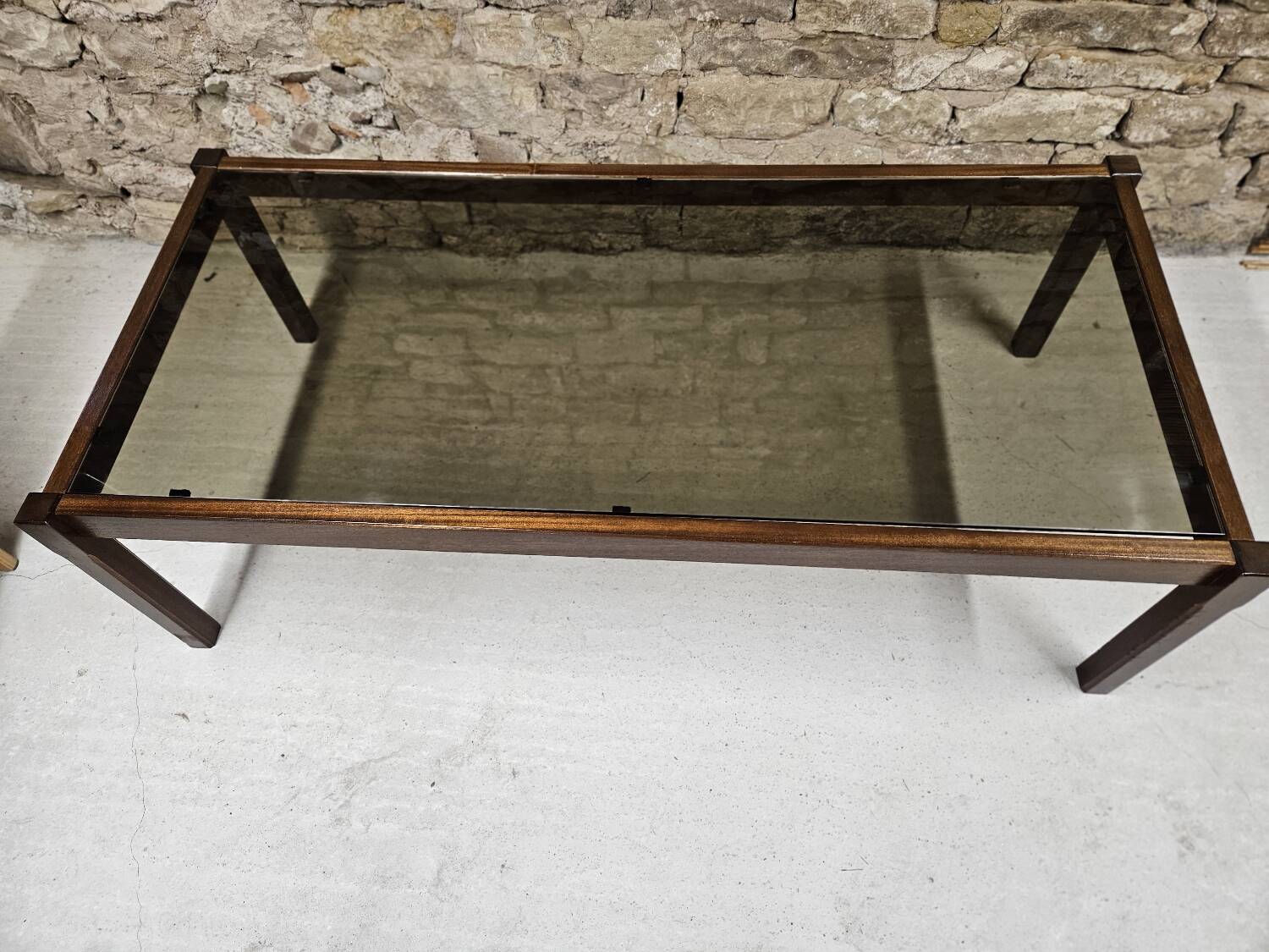 Teak coffee table with smoked glass 1970"