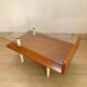 Table basse moderniste en bois , métal et verre