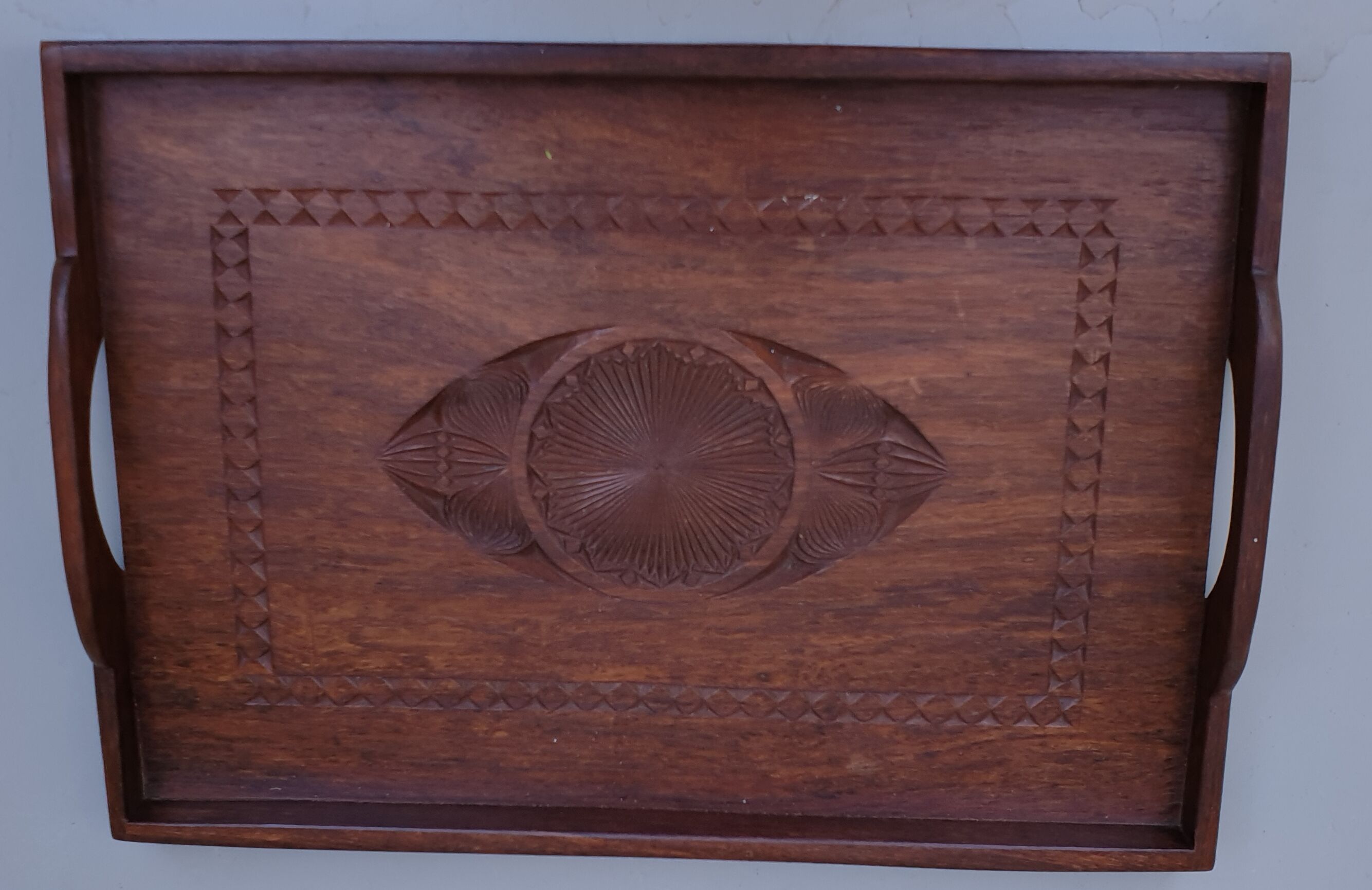Ancient carved wooden tray