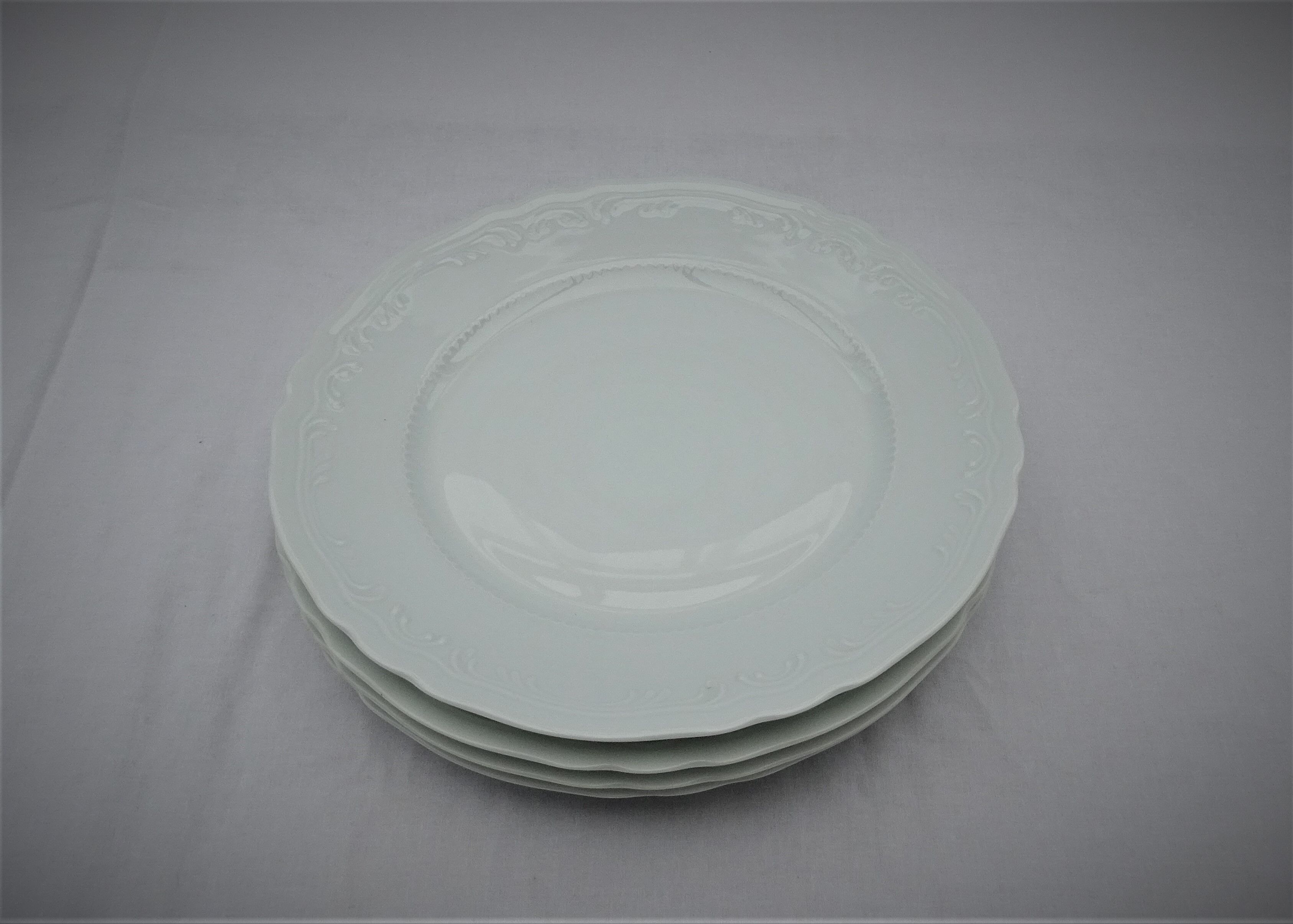 4 White de-serve plates Limoges