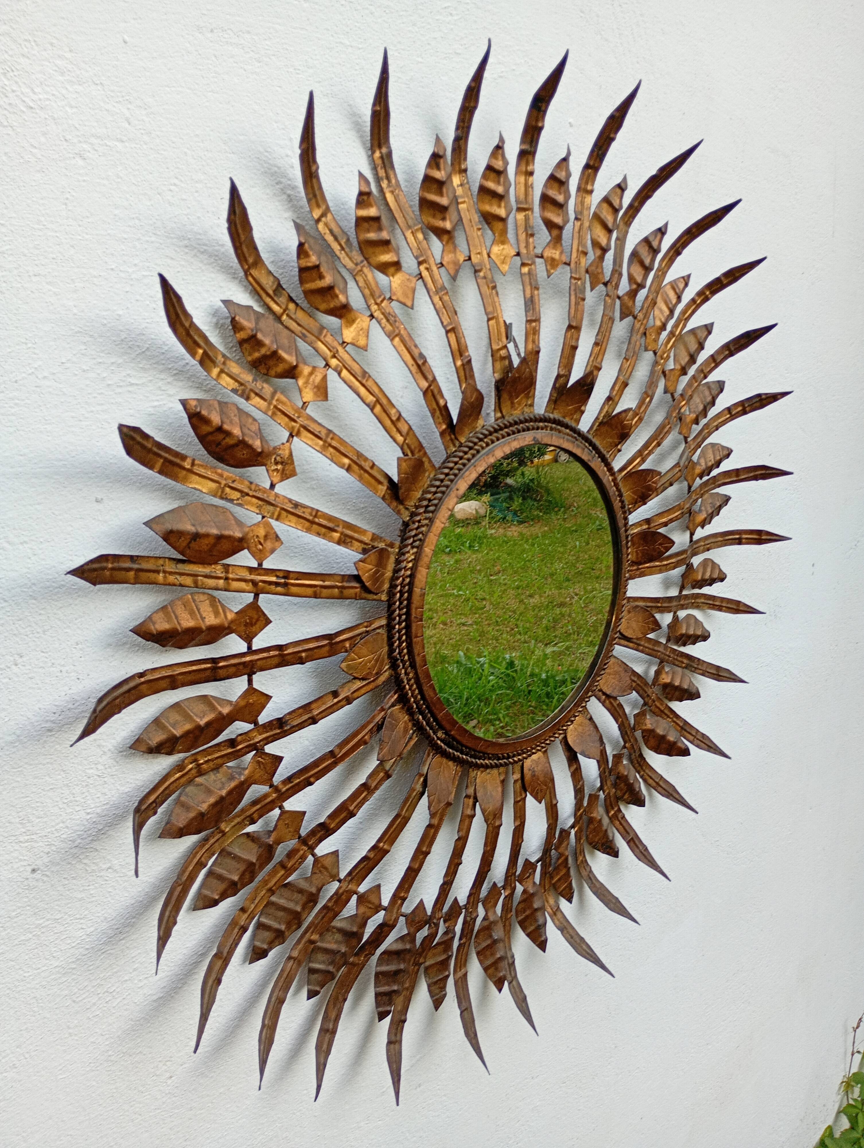 Vintage sun mirror in patinated gold metal – Spain 1950s / 60s
