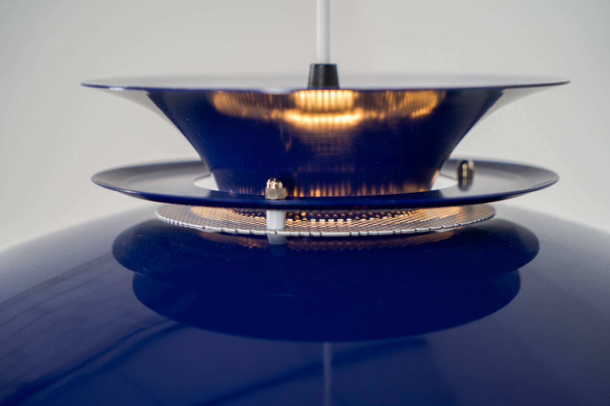 Elegant blue pendant light by Belux