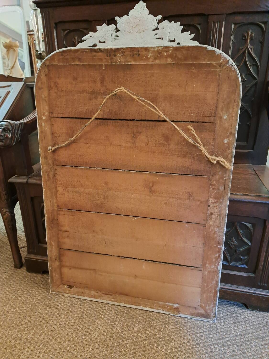 Louis Philippe mirror with patinated cartouche