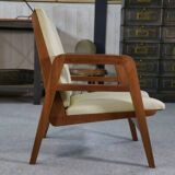 Modernist armchair in mahogany and skai 1940-1950