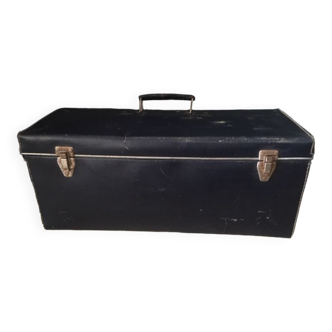 Old blue parallelepiped suitcase