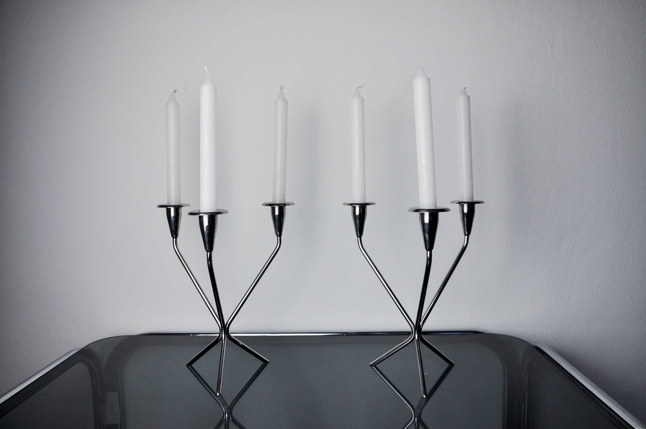 Pair of art deco stainless steel 3-flame candlesticks, Spain, 1970