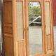 Grande armoire ancienne en chêne massif brut et cannage / dressing
