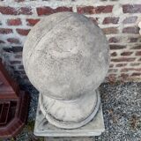 Ball on base in gray patinated reconstituted stone