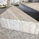 Pair of triangular coffee tables in travertine, Italy circa 70 / 80