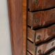 Transitional style chest of drawers in rosewood and amaranth veneer, 20th century.