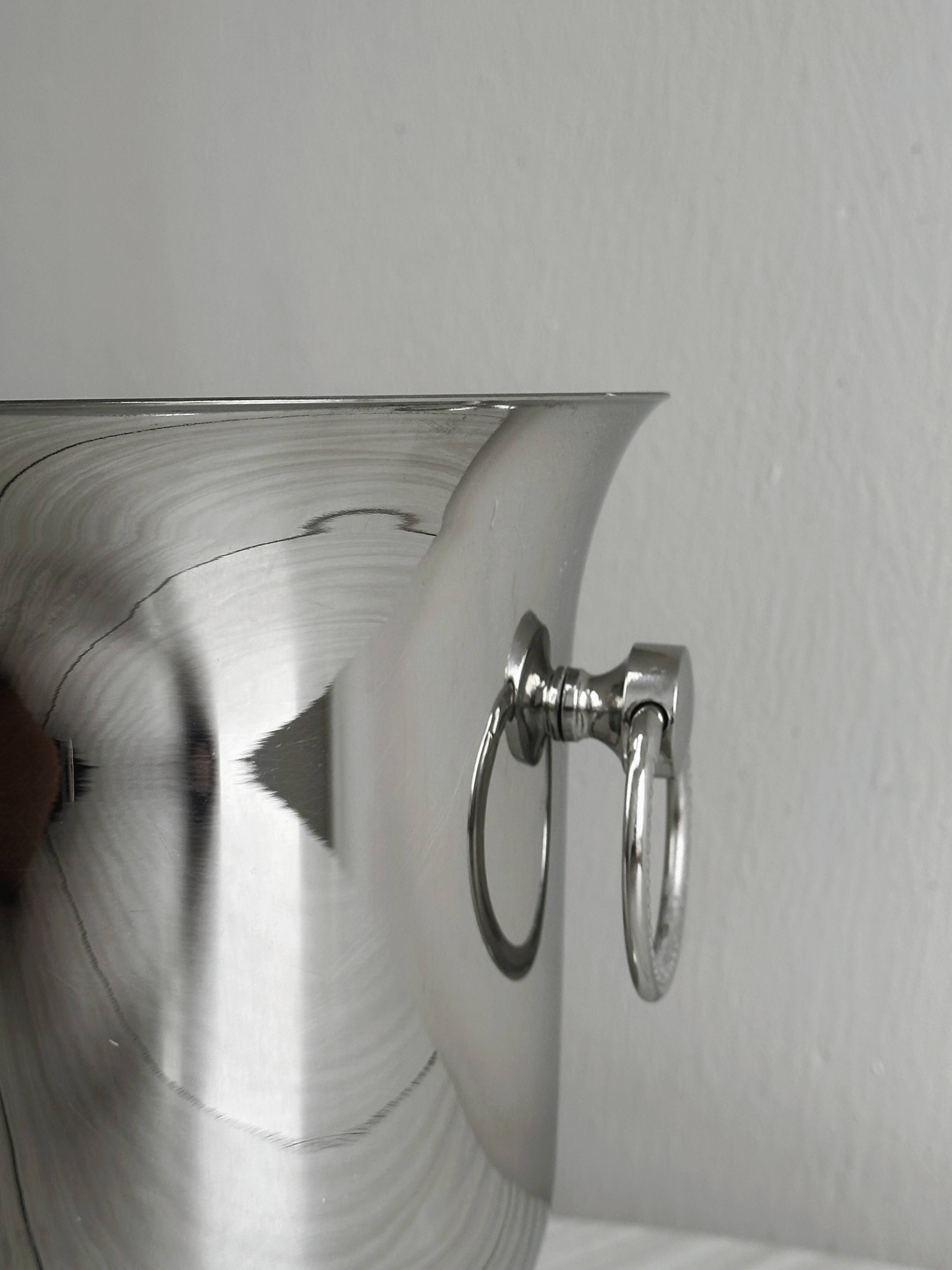 Shiny silver metal champagne bucket