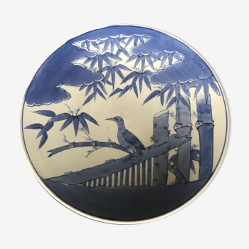 Cut center of table in ceramic decoration landscape nature and bird shade of blue